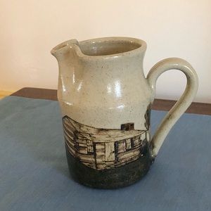 Artisan Pottery Pitcher with Cabin and Trees Motif